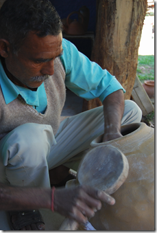 Manohar Lul working on a Mudka
